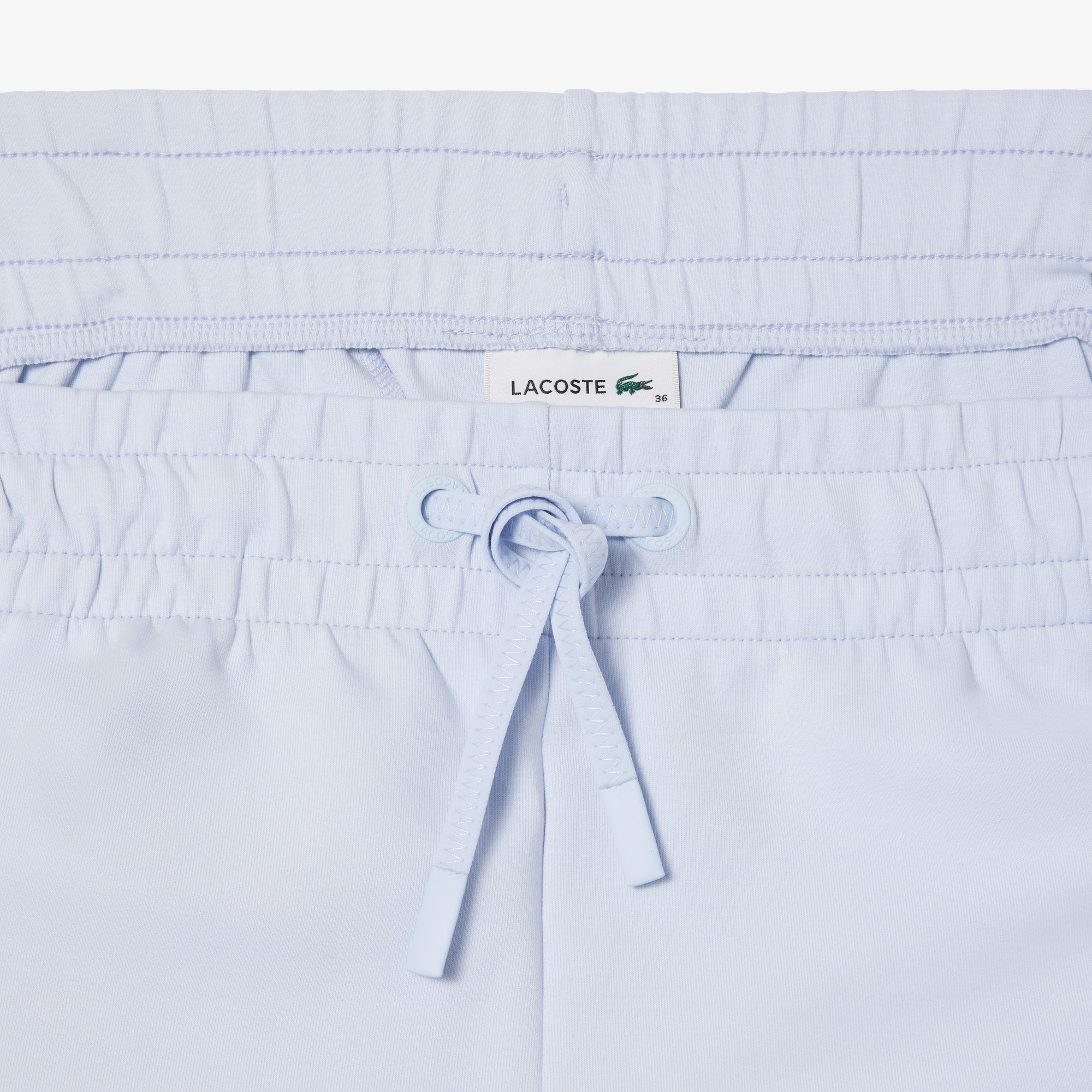 фото Женские однотонные шорты lacoste