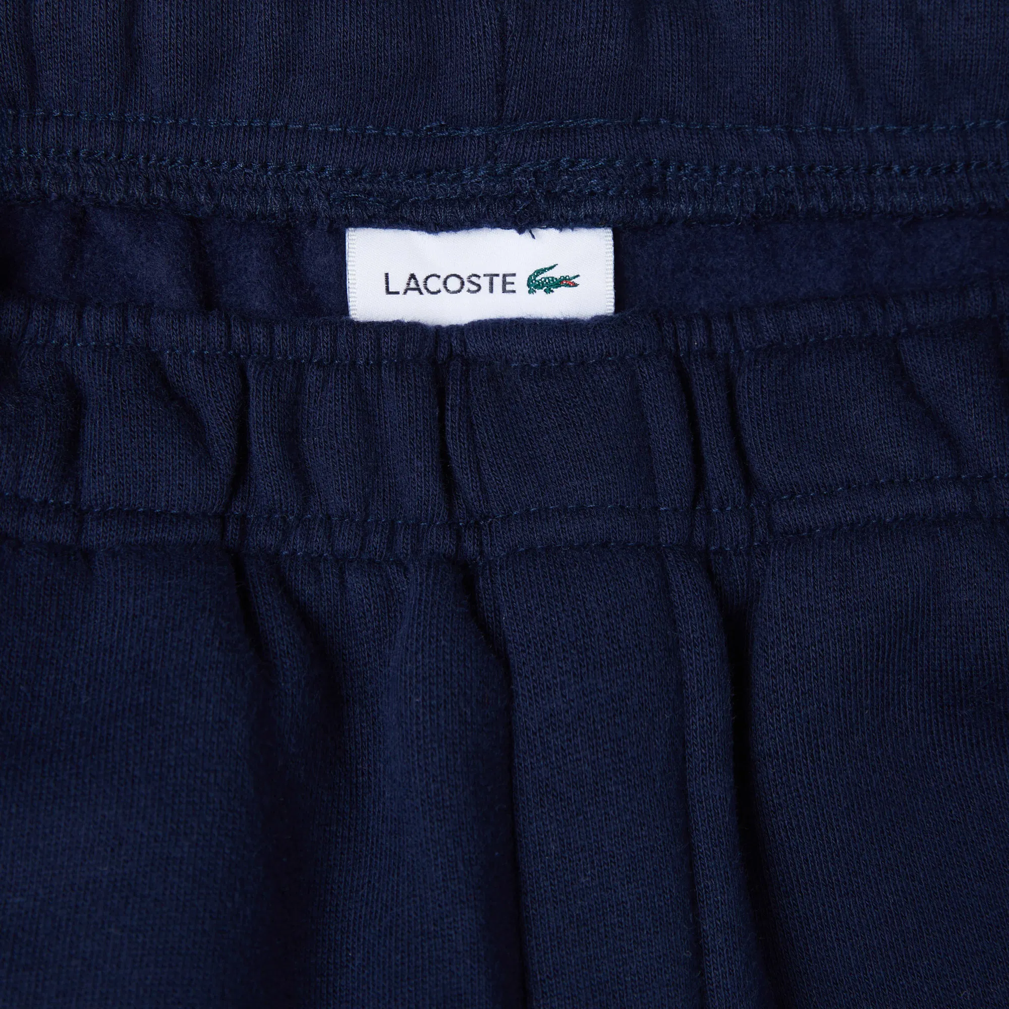 фото Детские спортивные брюки lacoste