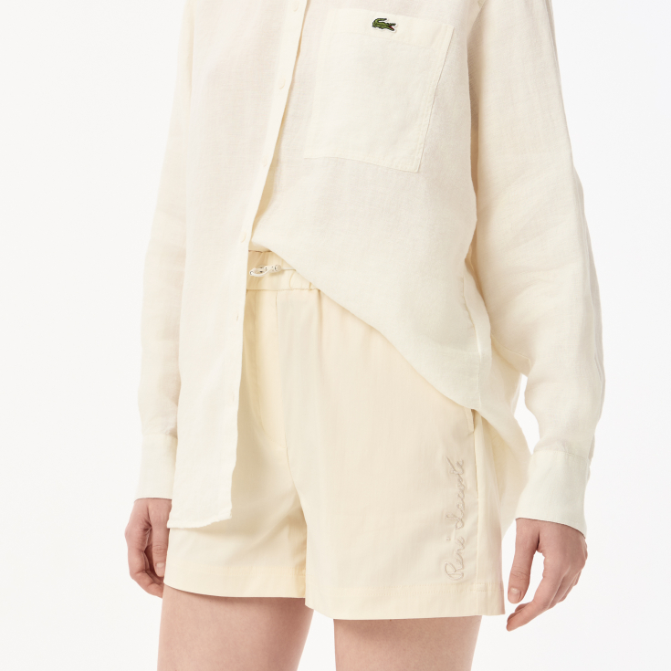 Женские короткие однотонные шорты Lacoste Женские короткие однотонные шорты Lacoste