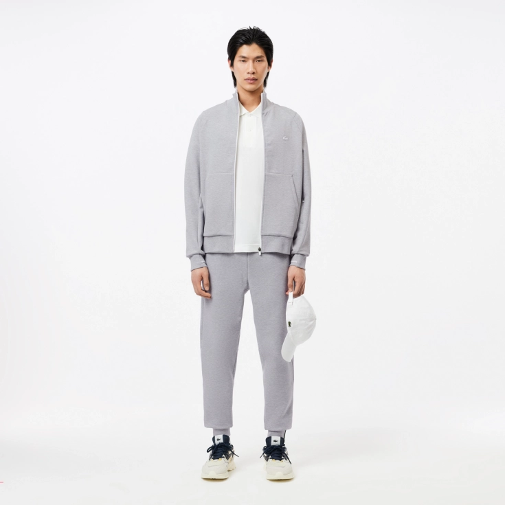 Мужские брюки Lacoste SPORT из меланжевой смеси хлопка Мужские брюки Lacoste SPORT из меланжевой смеси хлопка