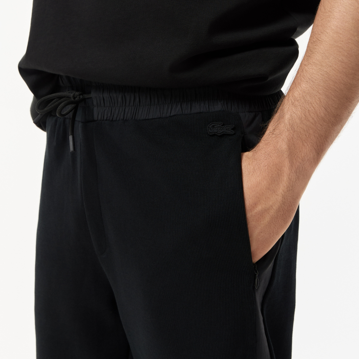 Мужские хлопковые спортивные брюки Lacoste Мужские хлопковые спортивные брюки Lacoste