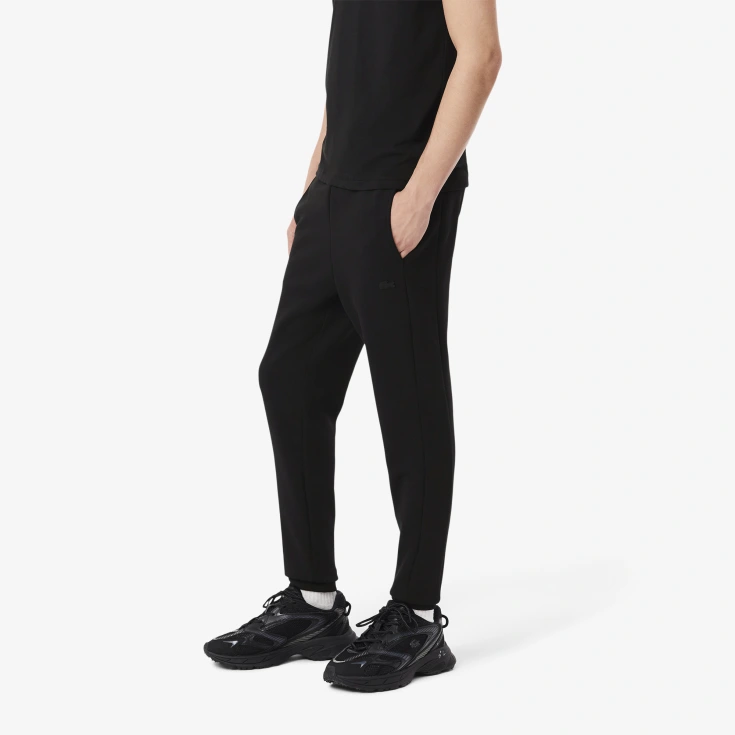 Мужские спортивные брюки Lacoste из эластичного органического хлопка Мужские спортивные брюки Lacoste из эластичного органического хлопка