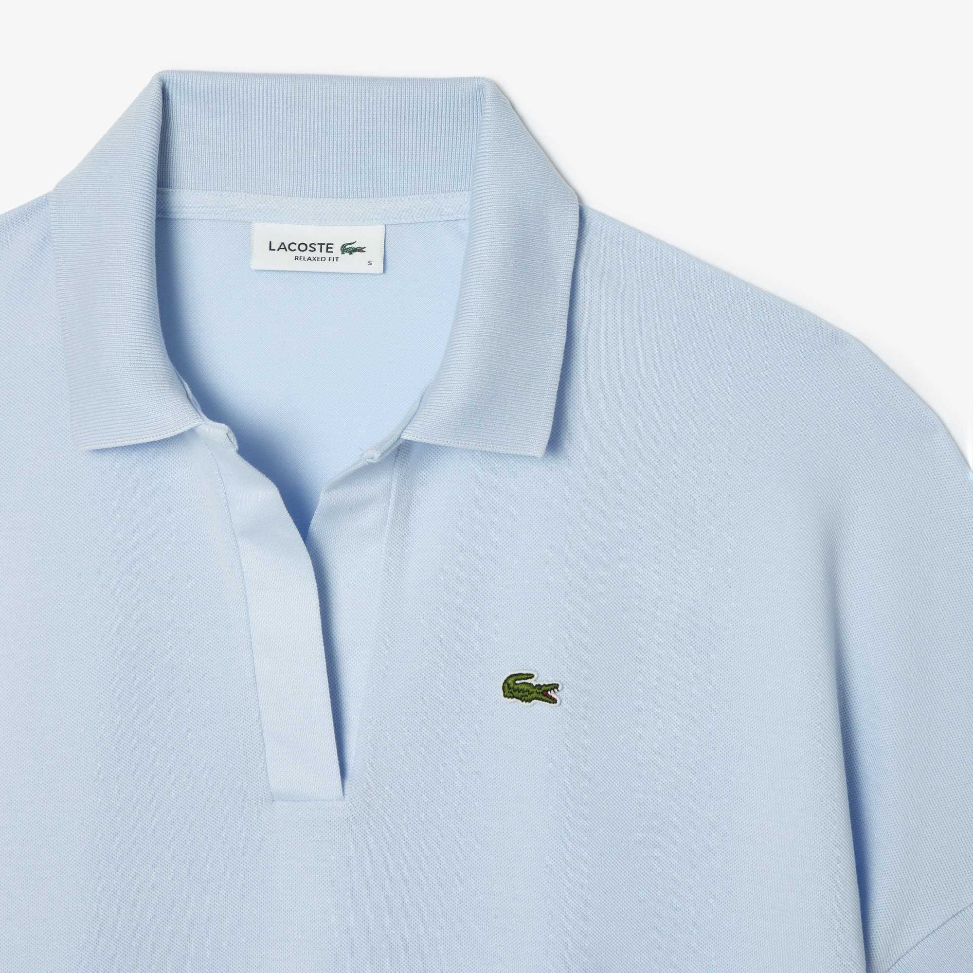 фото Женское поло lacoste loose fit