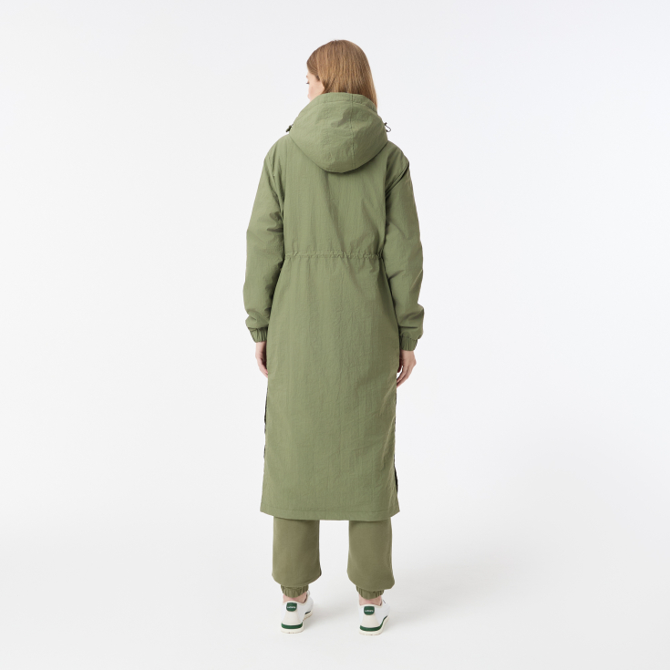 Женская длинная парка Lacoste с капюшоном и боковым клапаном на пуговицах