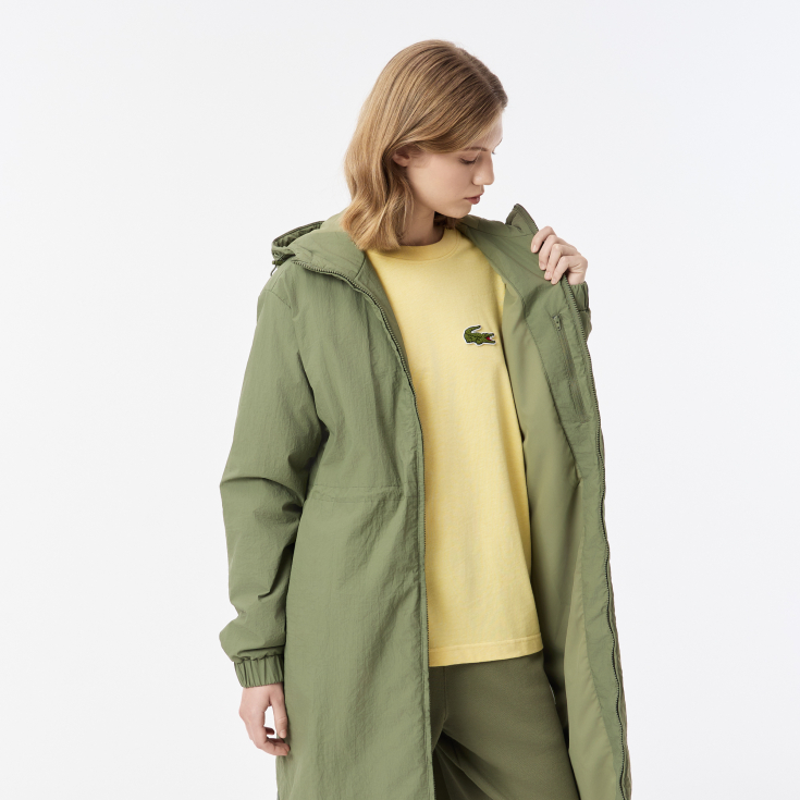 Женская длинная парка Lacoste с капюшоном и боковым клапаном на пуговицах