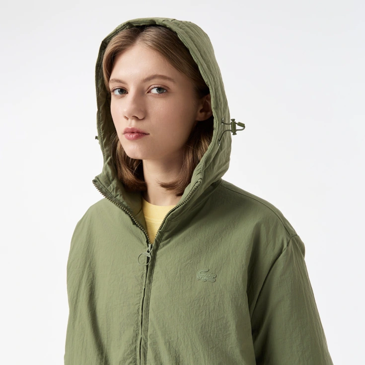 Женская длинная парка Lacoste с капюшоном и боковым клапаном на пуговицах