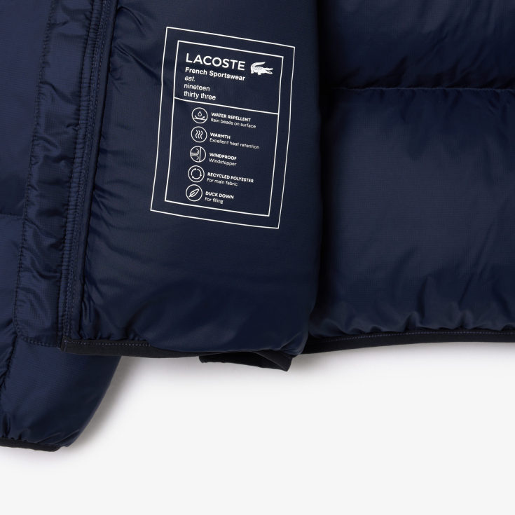 Мужской короткий влагоотталкивающий и ветроустойчивый пуховик Lacoste с капюшоном