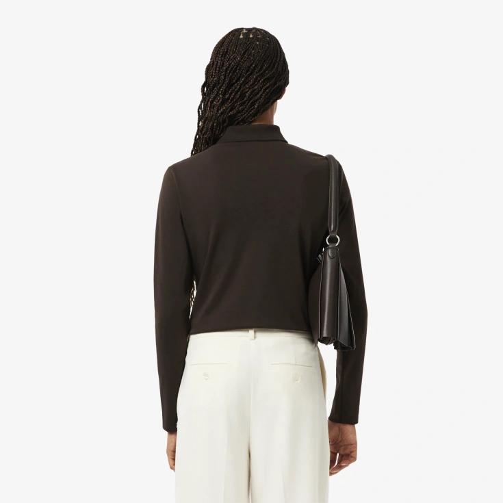 Женское поло Lacoste