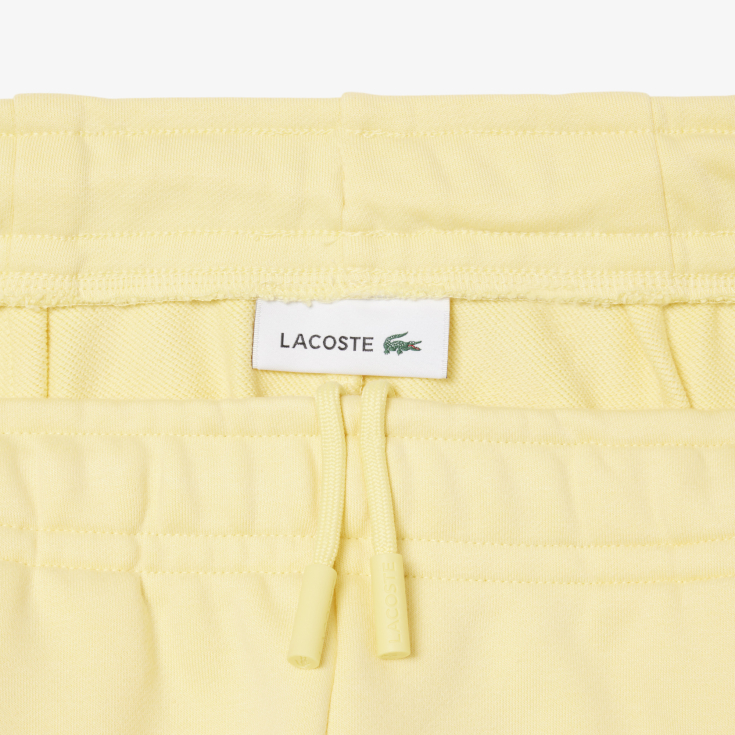 Женские плиссированные флисовые шорты Lacoste
