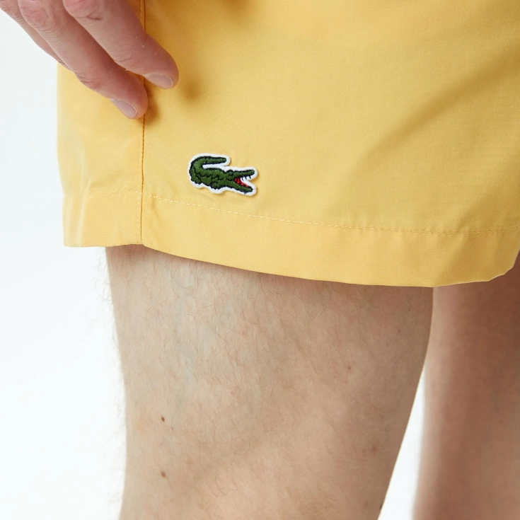 Мужские купальные шорты Lacoste