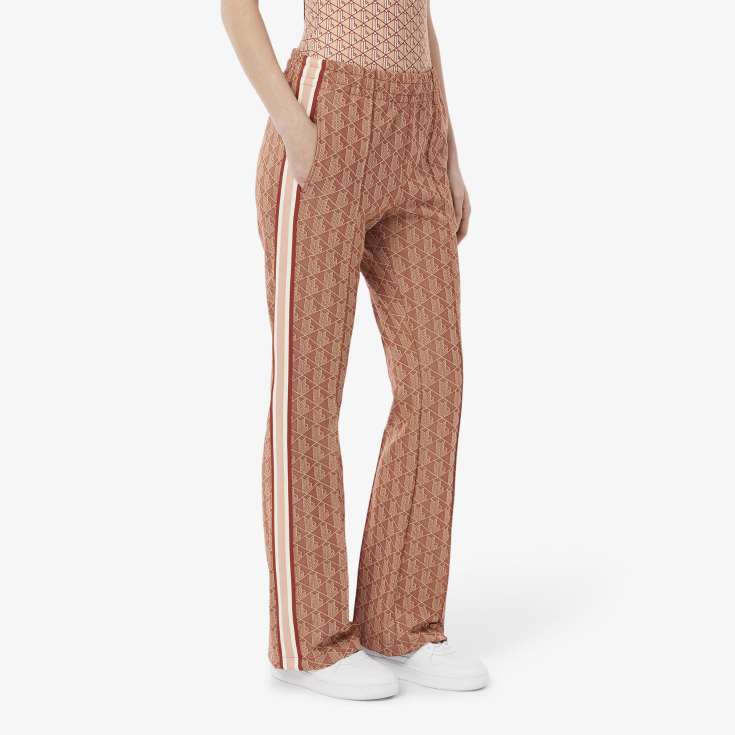 Женские расклешенные спортивные брюки Lacoste с монограммой