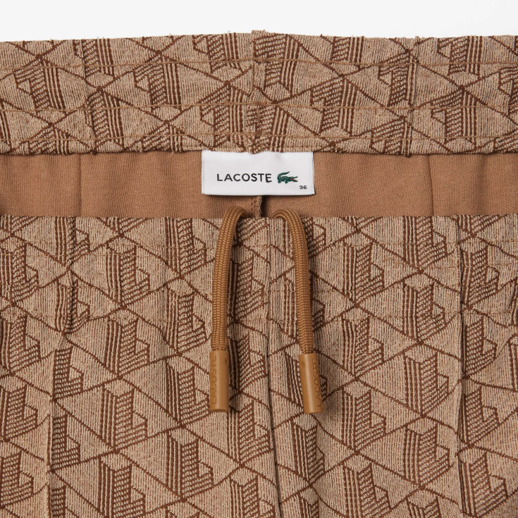 Женские расклешенные спортивные брюки Lacoste с монограммой