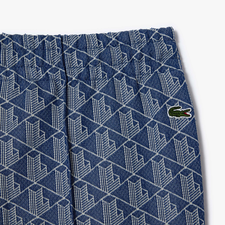 Женские расклешенные спортивные брюки Lacoste с монограммой