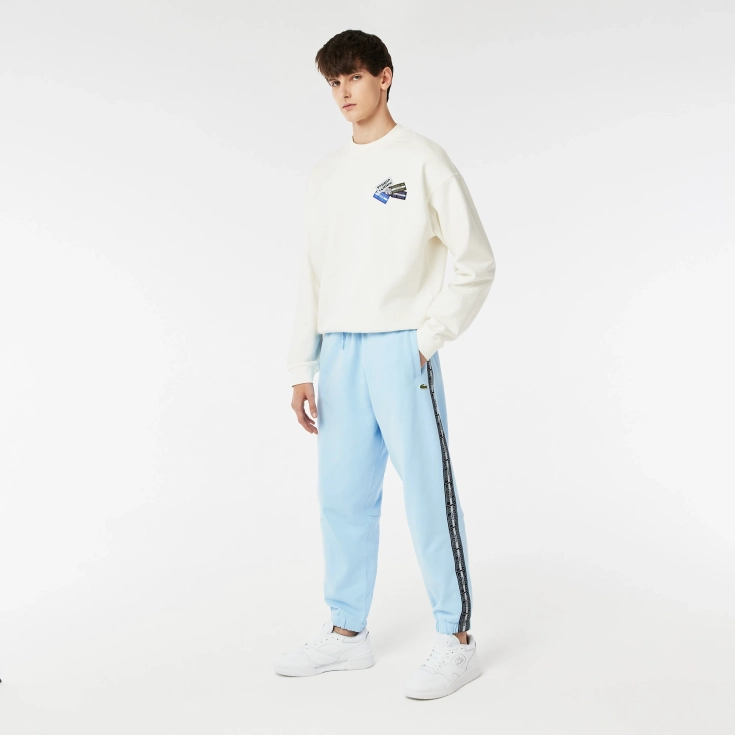 Спортивные брюки-джоггеры Lacoste в полоску с логотипом