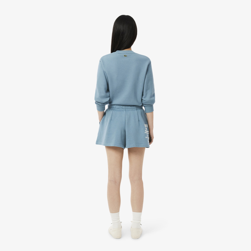 Женские плиссированные флисовые шорты Lacoste