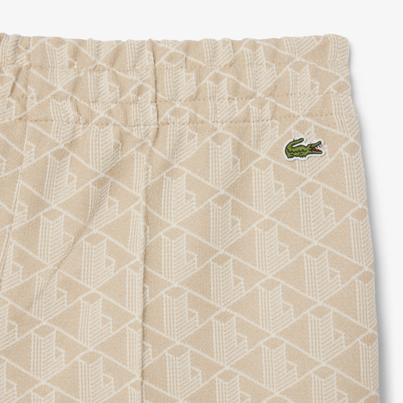 Женские расклешенные спортивные брюки Lacoste с монограммой