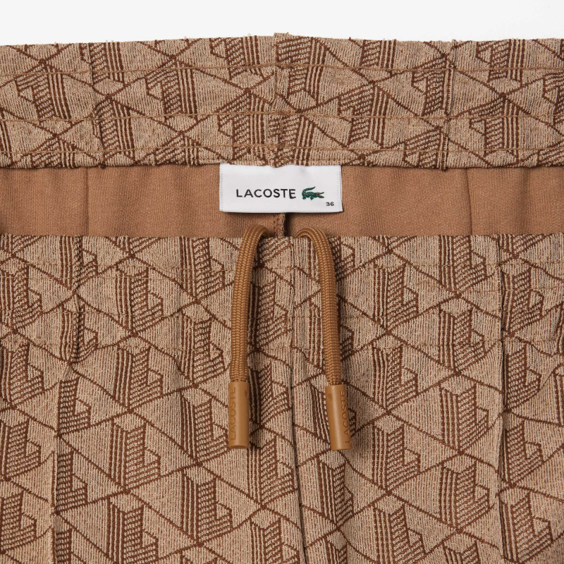 Женские расклешенные спортивные брюки Lacoste с монограммой