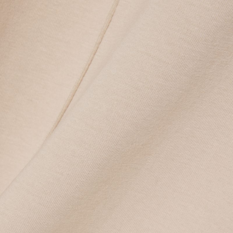 Женские хлопковые спортивные брюки-клёш Lacoste