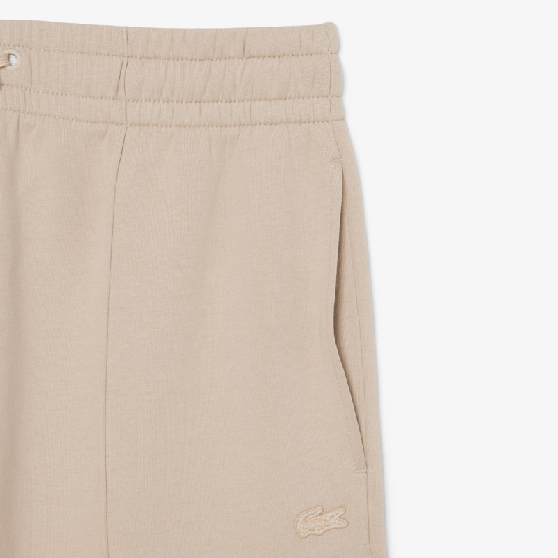 Женские хлопковые спортивные брюки-клёш Lacoste