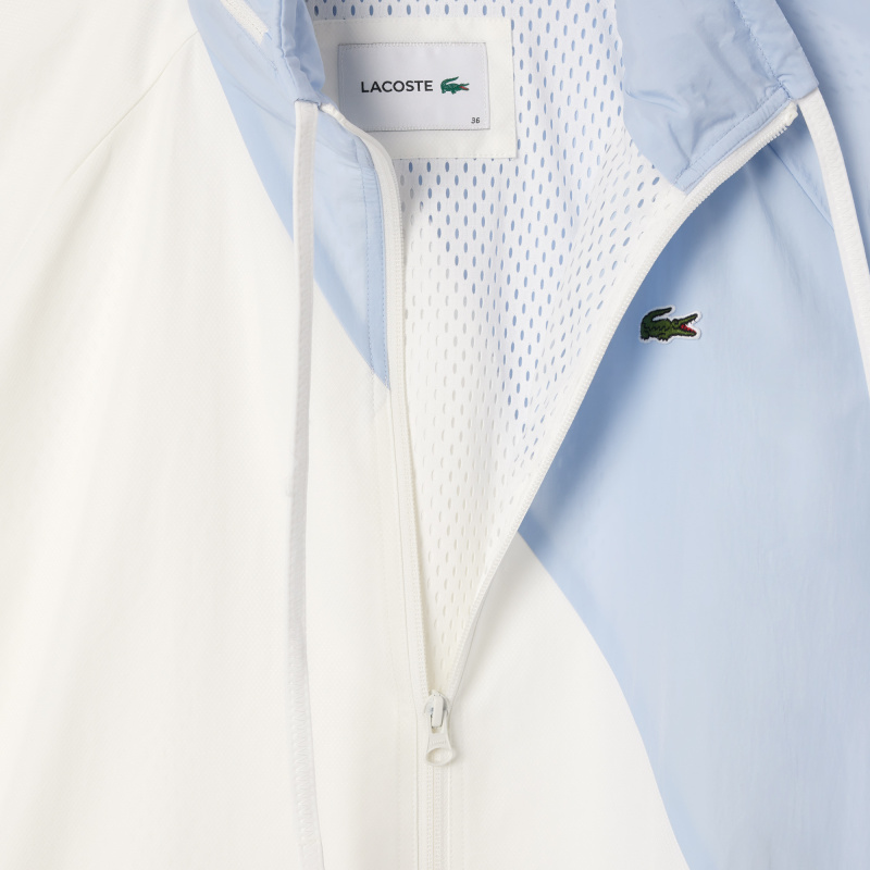 Женская объемная спортивная куртка Lacoste с капюшоном