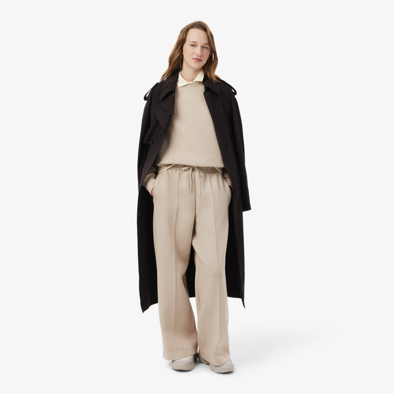 Женские хлопковые спортивные брюки-клёш Lacoste