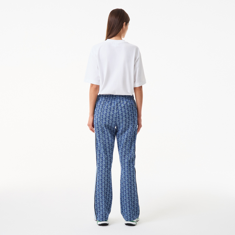 Женские расклешенные спортивные брюки Lacoste с монограммой