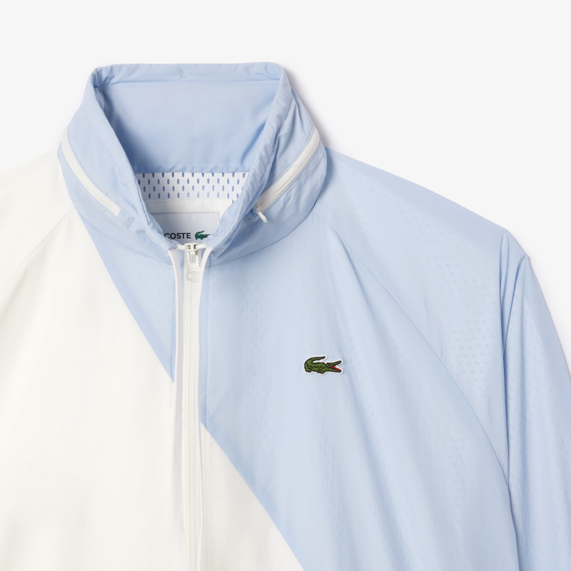 Женская объемная спортивная куртка Lacoste с капюшоном