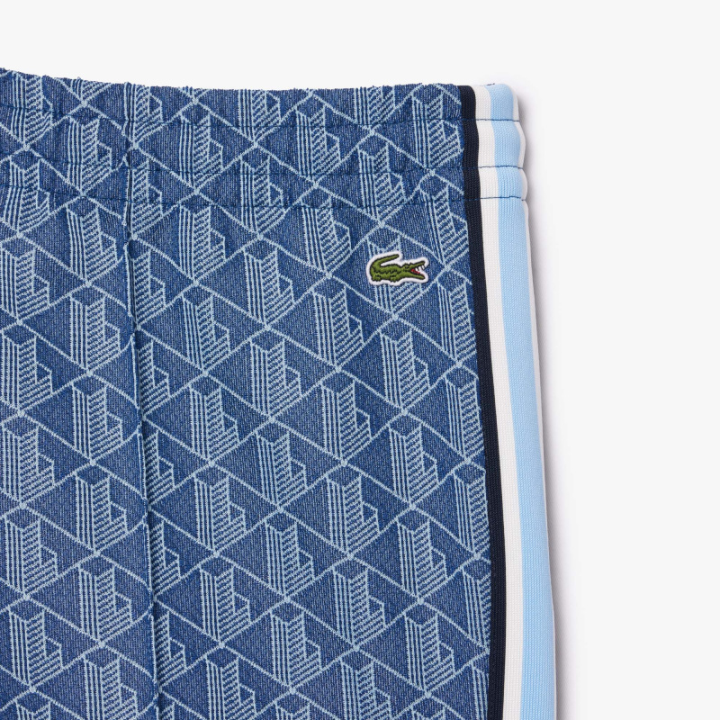 Женские расклешенные спортивные брюки Lacoste с монограммой
