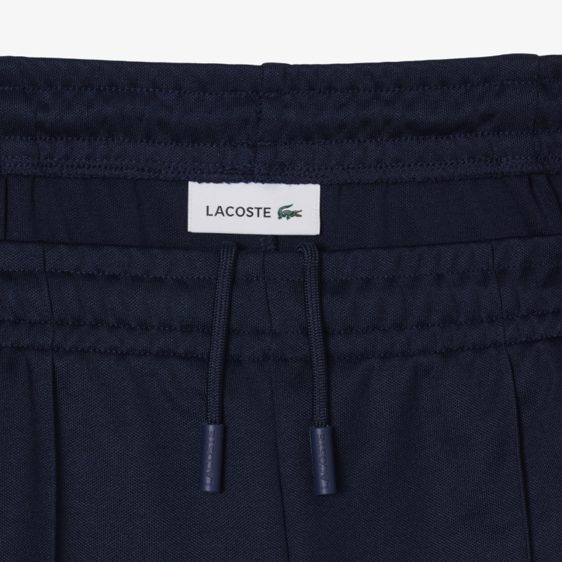 Женские спортивные брюки Lacoste с расклешенным кроем