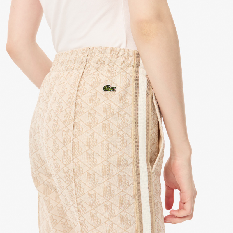 Женские расклешенные спортивные брюки Lacoste с монограммой