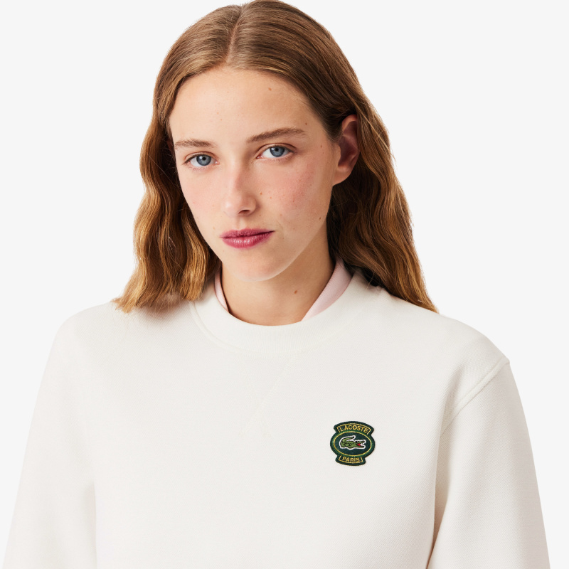 Женский свитшот Lacoste с круглым вырезом и нашивкой