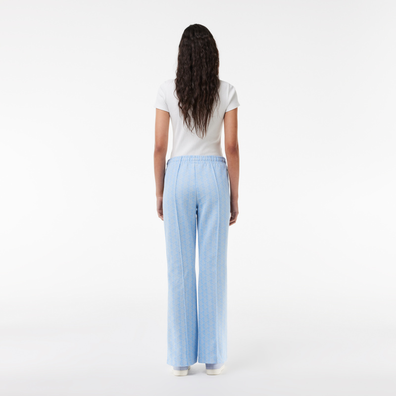 Женские расклешенные спортивные брюки Lacoste с монограммой