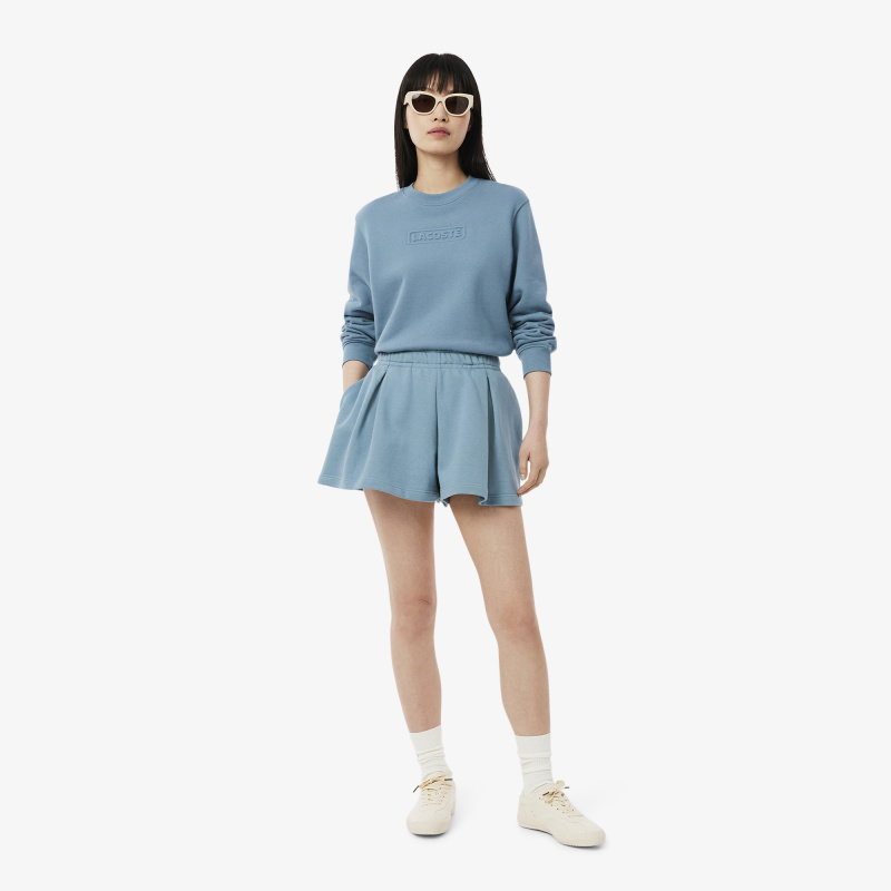 Женские плиссированные флисовые шорты Lacoste