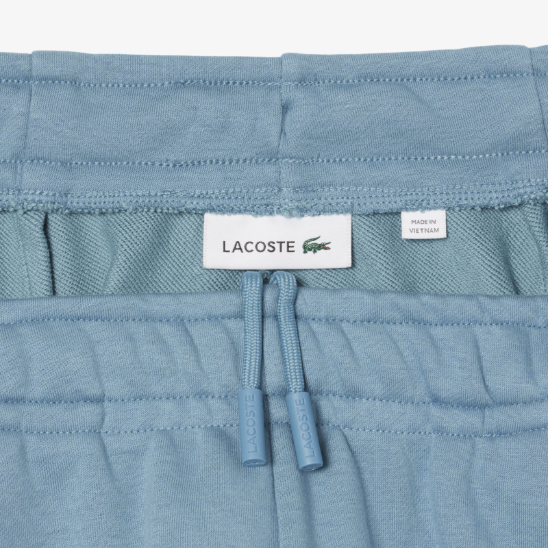 Женские плиссированные флисовые шорты Lacoste