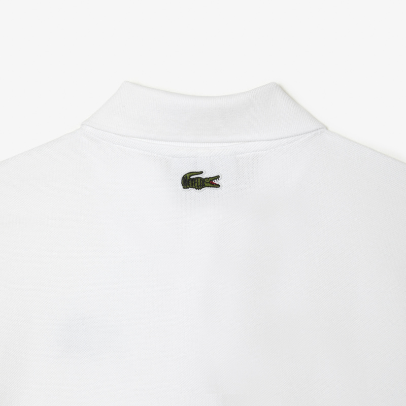 Женское поло Lacoste