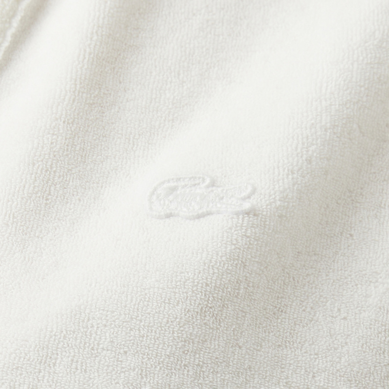 Женское поло Lacoste